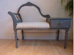 Picture of Vintage Seat With Small Side Table Attached