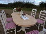 Picture of Grand Dining Table With 6 Large Upholstered Chairs