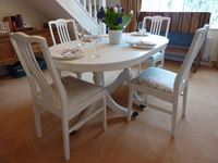 Picture of Extendable Dining Table with 4 Chairs