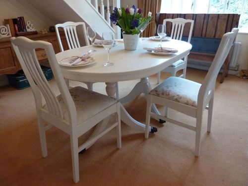 Picture of Extendable Dining Table with 4 Chairs