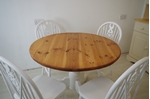 Picture of Round Pine Pedestal Table and 4 Wheelback Chairs