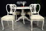 Picture of Round Louis style table with 4 Antique Lattice Back chairs