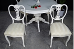 Picture of Round Louis style table with 4 Antique Lattice Back chairs